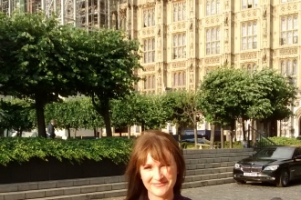 Rachel Giles outside the Houses of Parliament