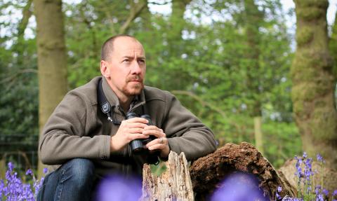 Man in bluebells c. Tom Marshall