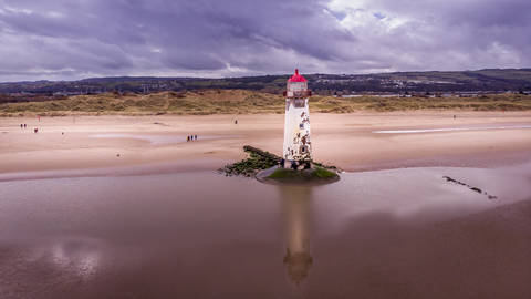 Talacre lighthouse when the tide is out, surrounded by sand