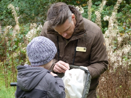 Nick Baker finding mini-beasts c. Claire Huxley