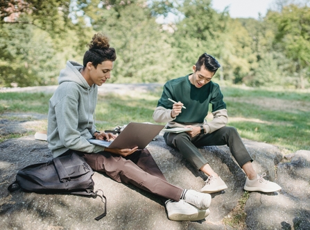 Young people writing 