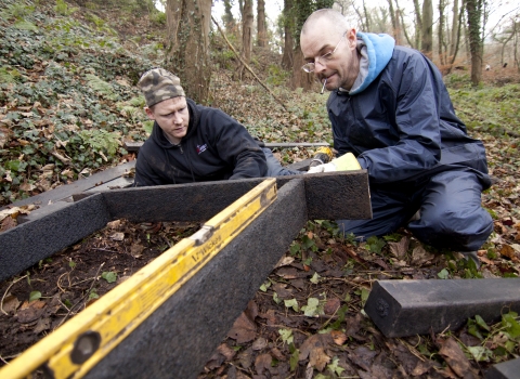 Volunteers building steps